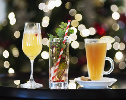 Three cocktails ready to be served in the Royal Deck Tearoom.