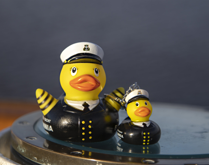 Britannia Admiral rubber duck and a miniature keyring version.