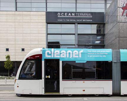 A tram makes its journey outside Ocean Terminal shopping centre.